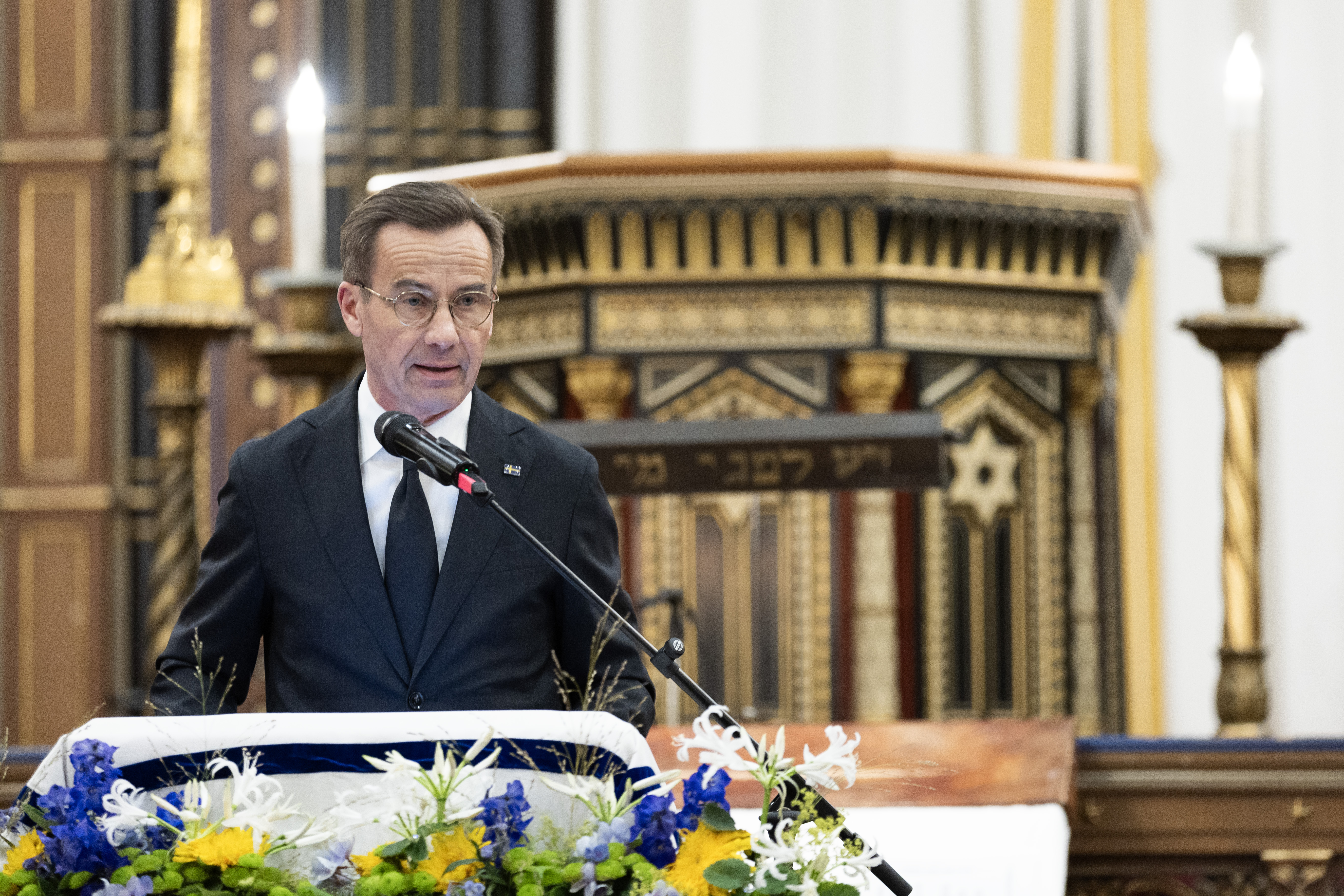 Prime Minister Ulf Kristersson delivers a speech during the memorial ceremony at Stockholm’s Great Synagogue on 7 October.